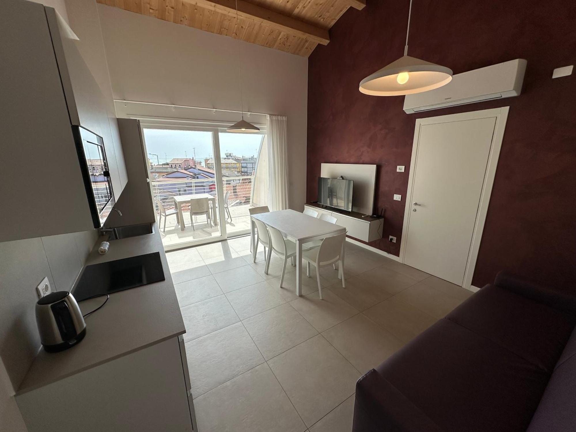 Woody Green Penthouse Sea View - Agenzia Cocal Καόρλε Εξωτερικό φωτογραφία